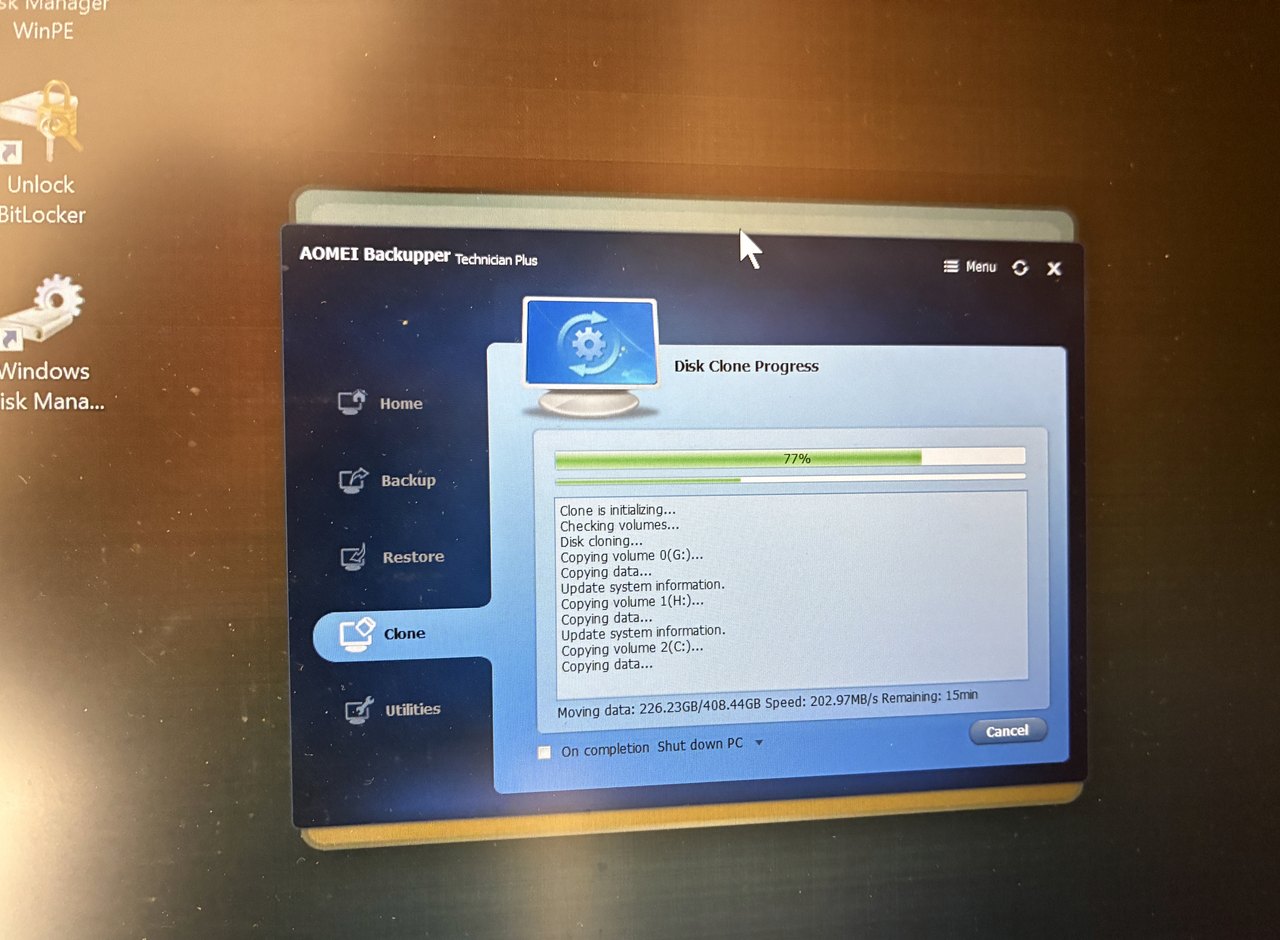 Clonazione disco AOMEI Backupper Technician Plus in WinPE al 77 percento, Unlock BitLocker sul desktop